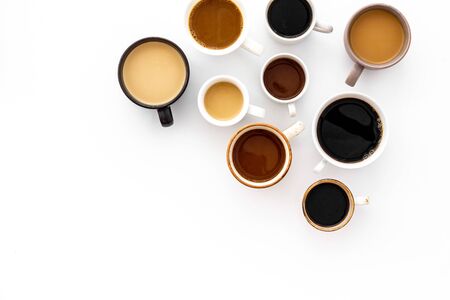 Many cups of coffee on white background top view.の写真素材
