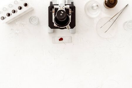Clinical science research with microscope. Laboratory equipment on white background top view.の写真素材