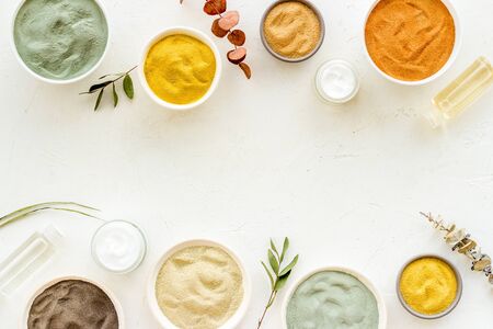 cosmetic clay - Yellow, red, white, blue and black dry powder - top-down flat lay space for textの写真素材