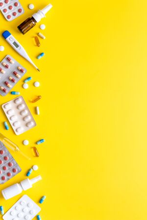 Pharmacy - pills, tablets - flu, cold health care. on white table top view space for textの写真素材