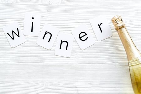 Winner congratulation concept with champagne top view.