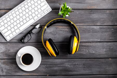 Flat lay webinar concept. headphones near laptop top view copy spaceの写真素材