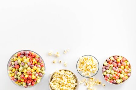 Colored popcorn in box on white background top view copy spaceの写真素材