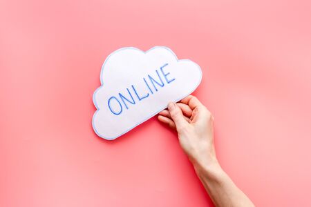 Cloud networking online internet concept. Paper bubble in hands top viewの写真素材