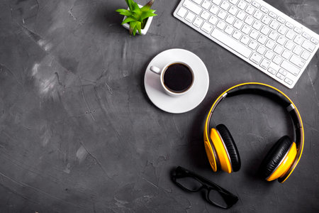 Flat lay webinar concept. headphones near laptop top-down copy space