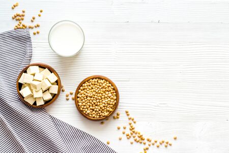 vegan soy milk with soy beans on white background top-down copy spaceの写真素材