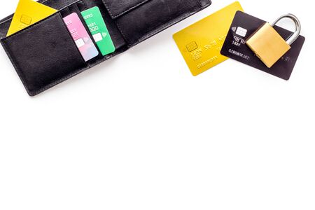 Credit card data security concept with lock on white desk top view copy spaceの写真素材