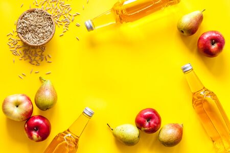 Set of beer bottles with apple, pears, wheat from aboveの写真素材