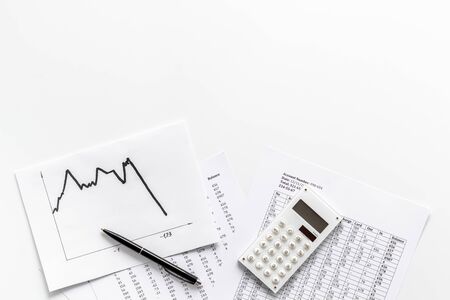 World financail crisis - arrow down, markets crash - on white office desk top view space for textの写真素材