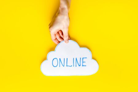 Cloud networking online internet concept. Paper bubble in hands top viewの写真素材