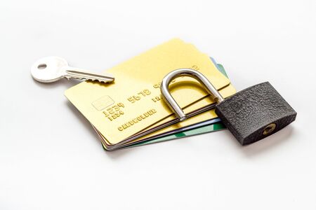 credit card hacked - security lock open - on table top view.