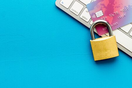 data security concept with credit card on blue table top view copy spaceの写真素材