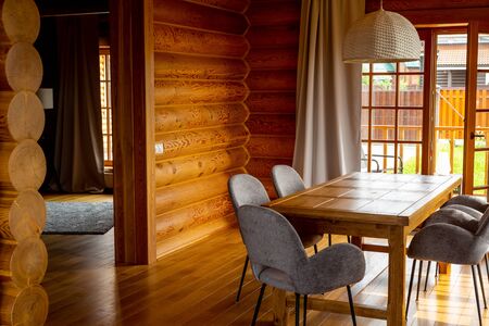 Wooden house interior - cozy room in sunlightの写真素材