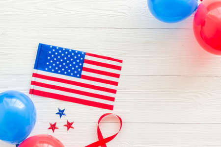 4th July greeting card with American flag and balloons flat lay.の写真素材