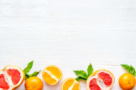 Citrus fruits on white background top viewの写真素材
