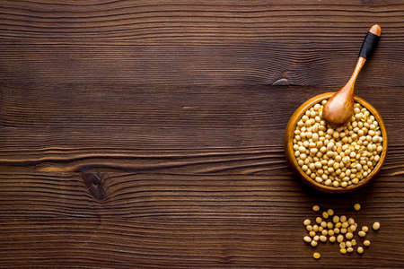 soy beans in bowl on wooden table top view copy spaceの写真素材