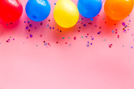 Happy birthday concept. Balloon on pink background top-down copy space