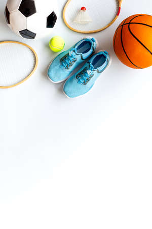 Sport games background - basketball, soccer ball, rockets, sneakers - copy spaceの写真素材