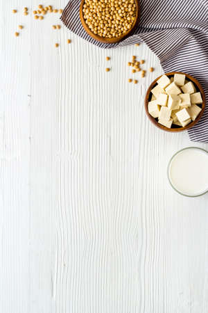 vegan soy milk with soy beans on white background top-down copy spaceの写真素材