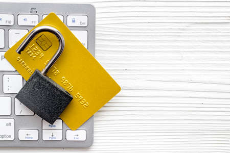 credit card hacked - open lock - on white background top view copy spaceの写真素材