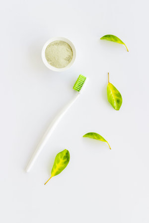 Herbal dental tooth powder with toothbrush. Organic health care concept