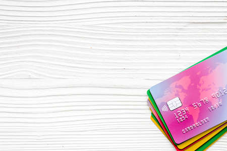 security concept. stack of credit card on white desk top-down copy spaceの写真素材