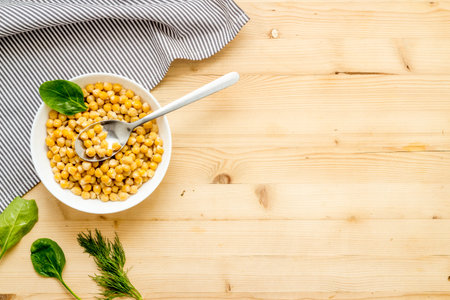 Chickpeas dishes. Vegan healthy food on wooden desk top view copy space