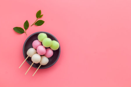 Japanese three colored dumplings Dango on plate, top viewの写真素材