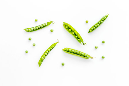Set of green pea pods isolated on white background