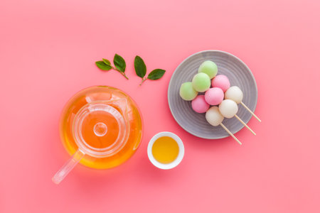 Asian dessert Dango rice dumplings and japanese teaの写真素材