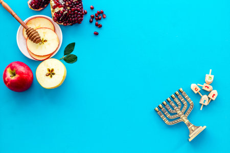 Jewish cuisine for rosh hashana holiday - apple honey and pomegranate, top viewの写真素材