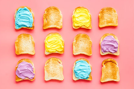 Colorful cheese spread on bread pattern, top viewの写真素材