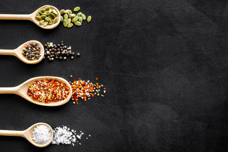 Herbs spices and flavoring on kitchen desk, top view