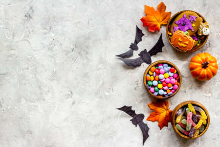 Halloween holiday banner design - pumpkins, cookies and autumn leaves, top viewの写真素材