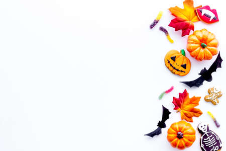 Halloween holiday banner design - pumpkins, cookies and autumn leaves, top viewの写真素材
