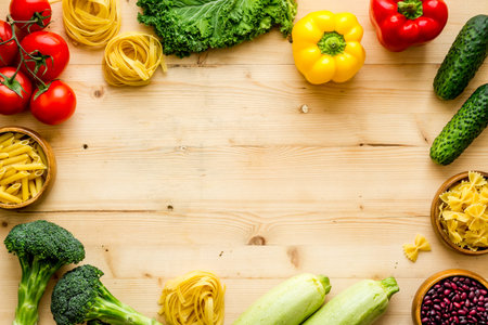 Healthy eating background with vegetables and herbs, top viewの写真素材