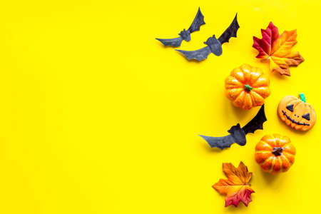Halloween holiday banner design - pumpkins, cookies and autumn leaves, top viewの写真素材