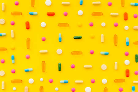 Pills and medicines pattern top view, medical pills and tablets backgroundの写真素材
