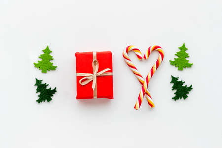 Pattern of christmas decoration with gifts and glass balls, top viewの写真素材