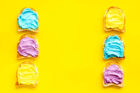 Set of slices toast bread with butter and cheese spread. Top viewの写真素材