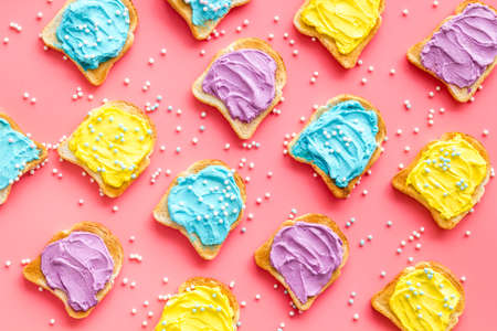 Colorful cheese spread on bread pattern, top viewの写真素材