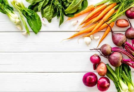 Set of vegetables. Carrot and beet with tops, potato, garlic top view copy spaceの写真素材
