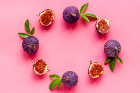 Fresh purple fig fruit with leaves. View from aboveの写真素材