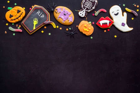 Flat lay of homemade Halloween cookies. Top view, copy space