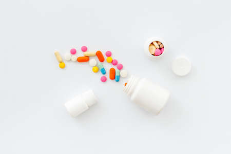Pills bottle with medicines and vitamins, view from aboveの写真素材