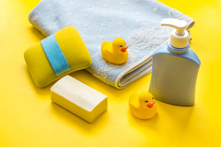 Newborn bath time concept with care cosmetics productの写真素材