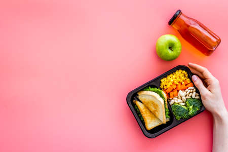 Overhead view of food delivery lunch boxes with mealの写真素材