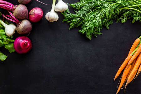 Healthy food. Vegetables - carrot, beet, potato - top view frame copy spaceの写真素材