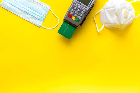 Payment terminal with face masks. Payment for hospital and medical servicesの写真素材