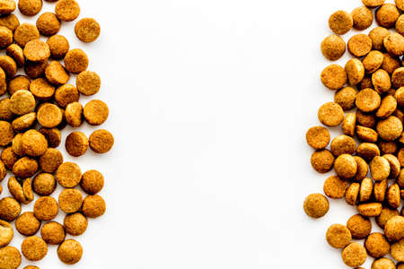 Dry pet dog food background with copy space. Above viewの写真素材